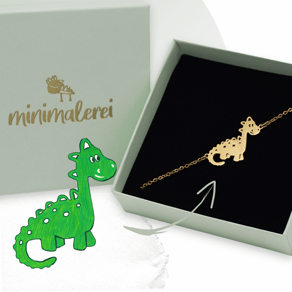 Goldfarbenes Armband mit Kinderzeichnung – die Zeichnung als filigraner Anhänger, konturgenau ausgeschnitten